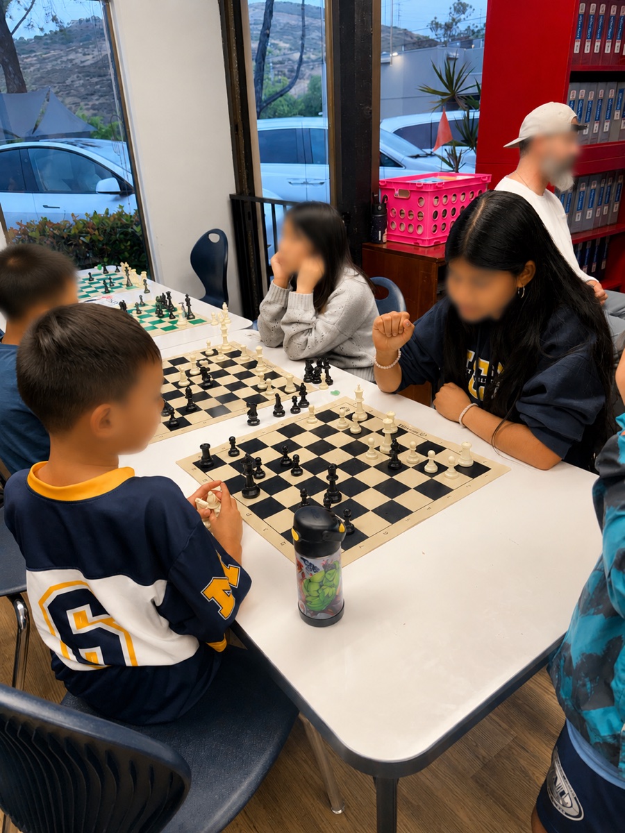 Navid working with students during a lesson